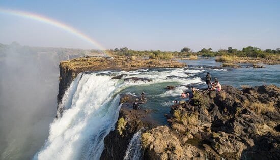 Swimming at the edge of Victoria Falls at Devil’s Pool