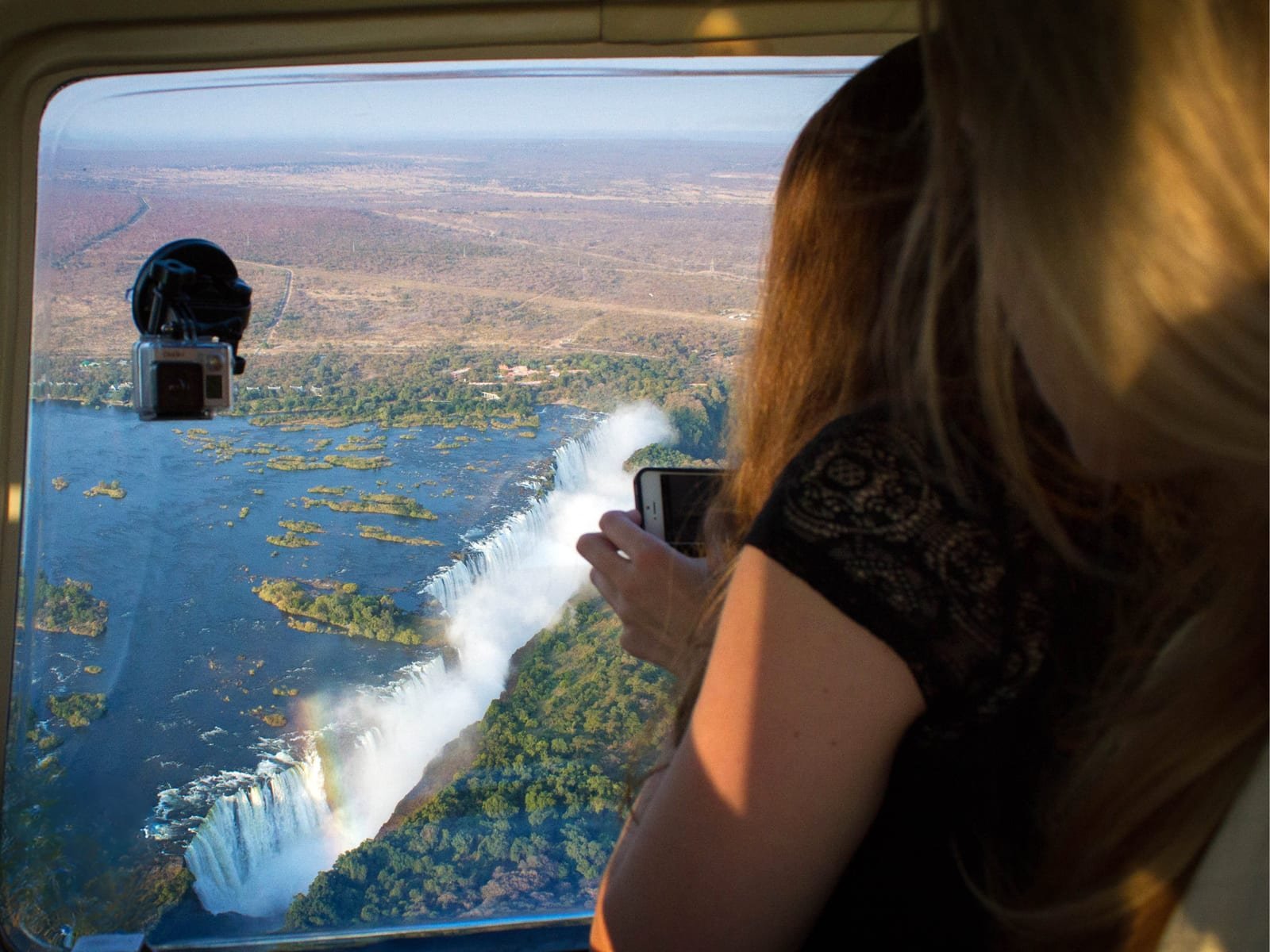 Tourist enjoying the view of Victoria Falls from the air